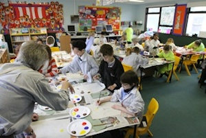 Children painting in primary school