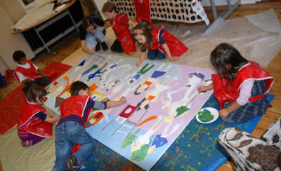 Art lesson creating a mural