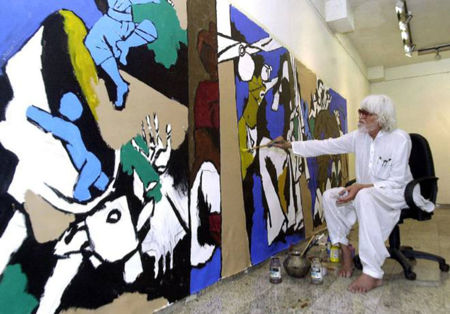 Indian artist M F Husain painting in Doha